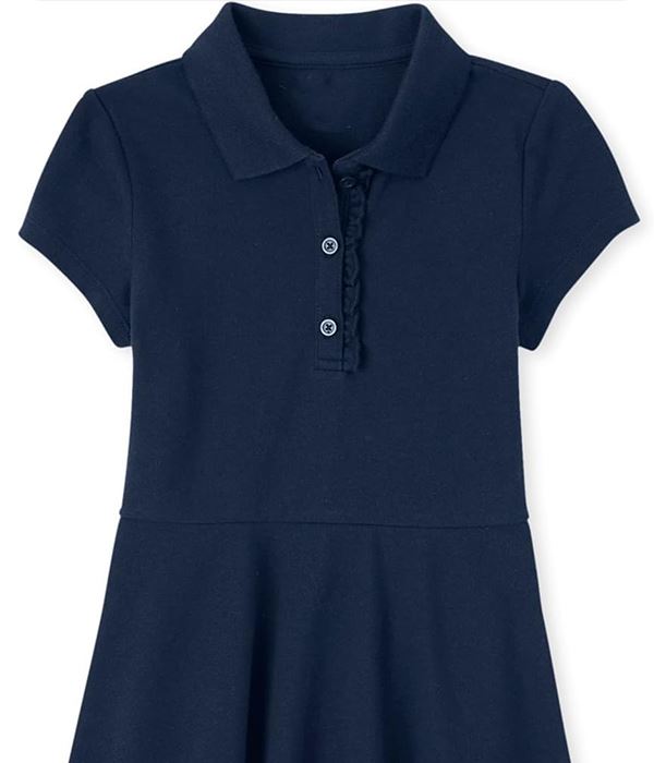 Child wearing a white polo shirt