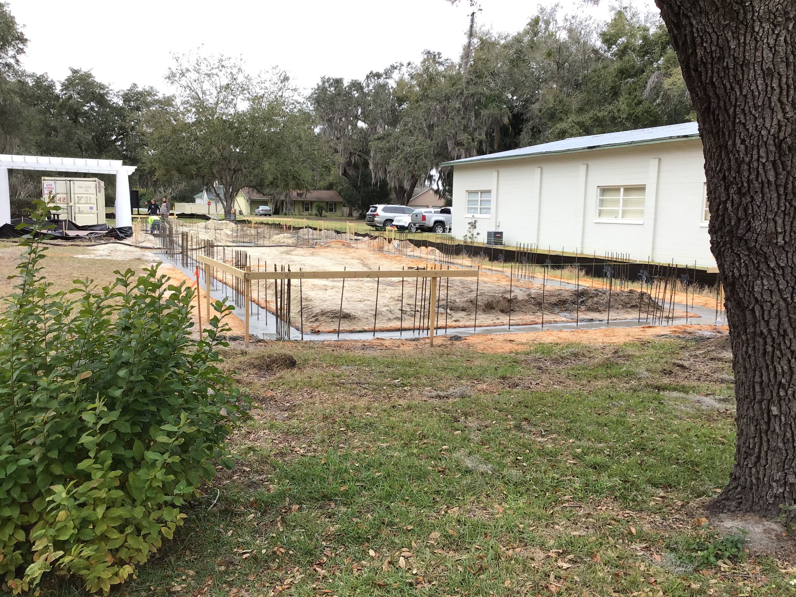 View of newly poured footings from West Orange Trail